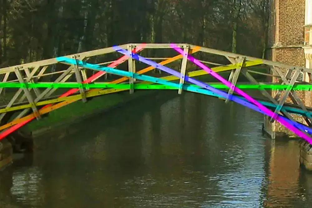 A photo of the Mathematical Bridge, edited to colour-code the individual straight beams that make up the arch.